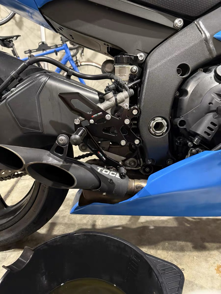 مساند أقدام خلفية قابلة للتعدي - مراجعة Motorcycle Gear Lever Extender وسعره